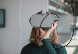 Young woman using VR technology