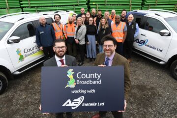 Alfie Beaney, CEO of AB Installs (front left) and Lloyd Felton, CEO of County Broadband (front right).